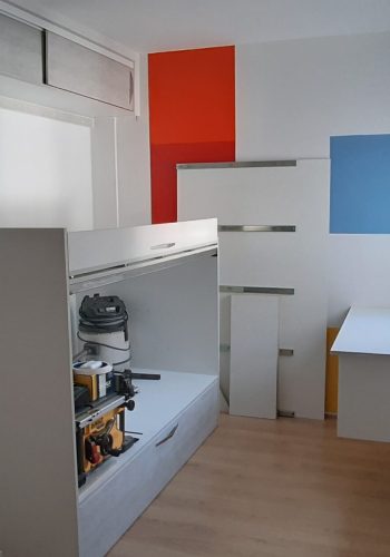 Dormitorio juvenil, con camas nido, armario en L y adaptado a todo uso 1 (1)